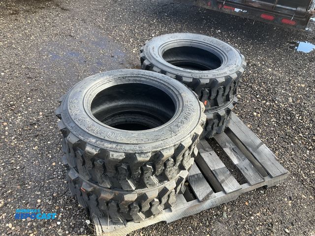 Lot 2-41017 - (4) new unused 10-16.5 skid steer tires