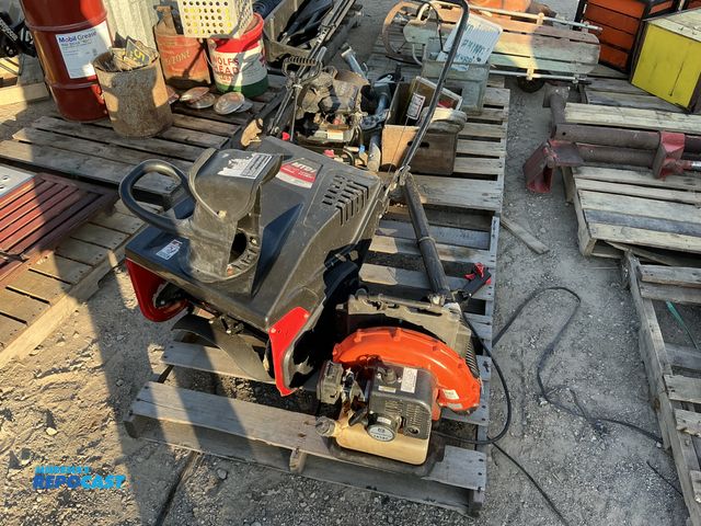 Lot 2-69009 - Skid lot of MTD Snowblower with a Husqvarna Backpack Leaf Blower