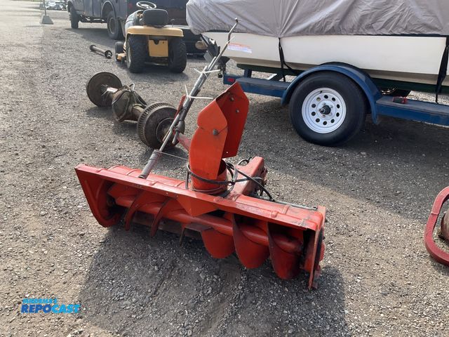 Lot 2-20927 - Simplicity 42” snowblower attachment for a riding mower, belt driven, ID NO. 1690548 005231, in used...