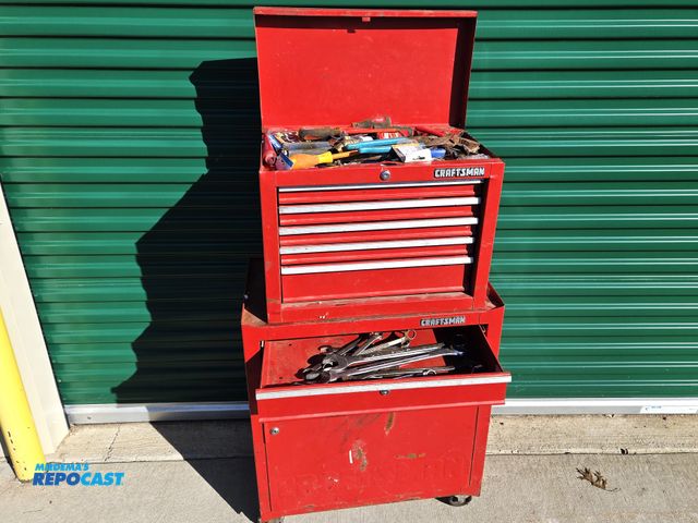 Lot 2-93556 - Craftsman rolling tool chest filled with hand tools. as found in unpaid storage unit.