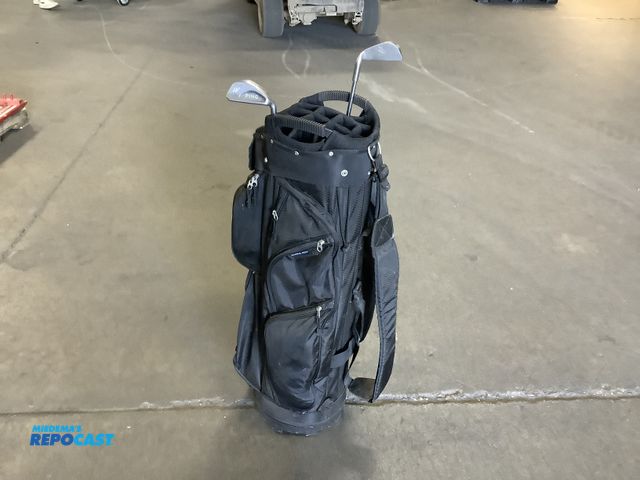 Lot 2-16274 - Naples bay heavy duty black golf bag with assorted zipper pockets including 2 putter clubs