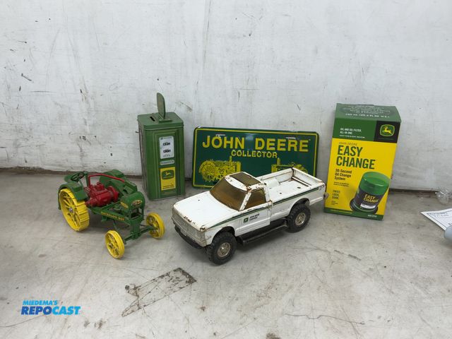Lot 2-67970 - Lot of John Deere items including license plate, fuel tank piggy bank, easy change oil change system...