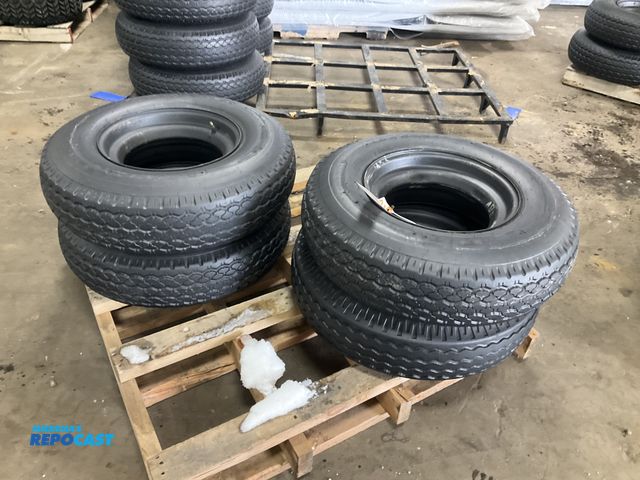 Lot 2-42610 - (4) 8-14.5 tires on steel mobile home style wheels, used