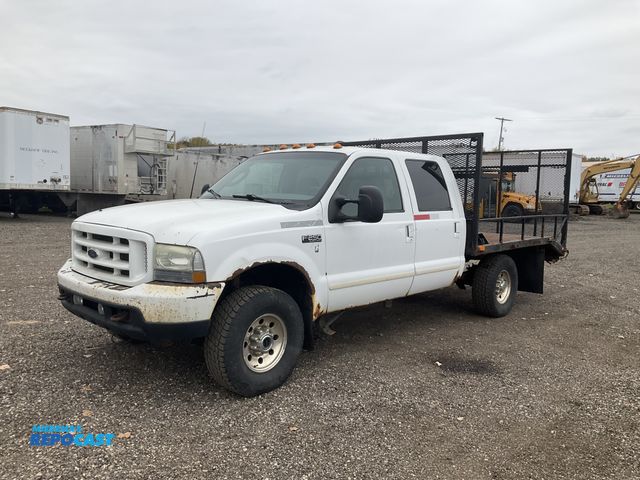 Lot 2-41003 - 2003 Ford F250 Crew Cab Flatbed Pickup Truck 4x4