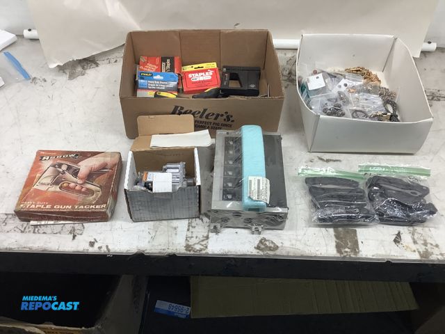 Lot 2-99105 - Lot of miscellaneous items including: heavy duty staple gun tacker, Bostitch staples, pocket knives,...