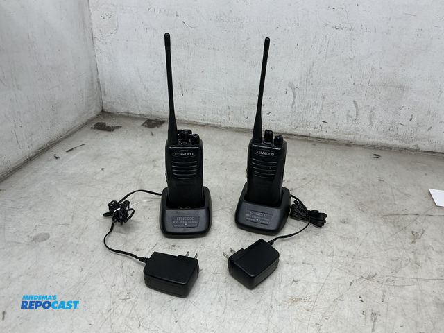 Lot 2-27299 - (2) Kenwood TK-3400U4P Protalk rugged 4-channel UHF business two-way radios And (2) KSC-35S single-s...