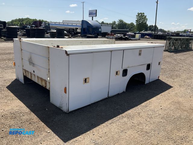 Lot 2-40282 - Reading 11’L Utility service body, side storage compartments, some minor rust, used, came of a 2015 ...