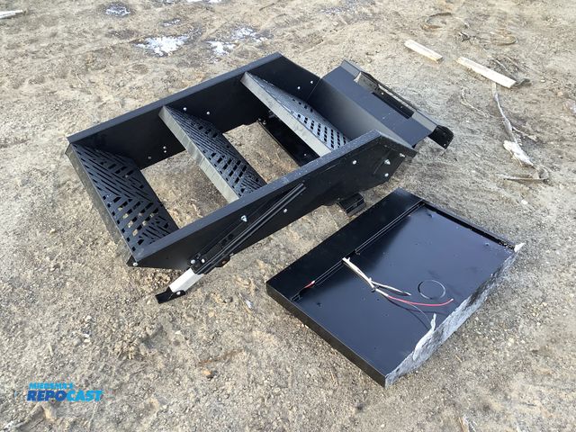Lot 2-73160 - Lot of (2) including: Furrion 12v range hood FHO24SDSRV-BL and suburban S0P1571A 4 step RV steps