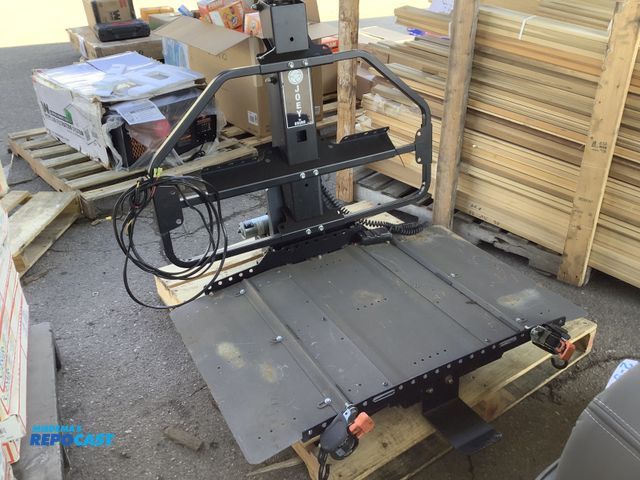 Lot 2-94933 - Skid lot of (1) black wheel chairlift Joey by Bruno model VSL-4000HW slightly rusted works