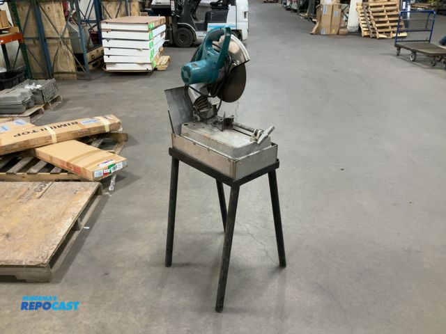 Lot 2-33204 - Makita Abrasive Metal Saw - model 2414B - works good per seller - comes with stand and sparker defle...