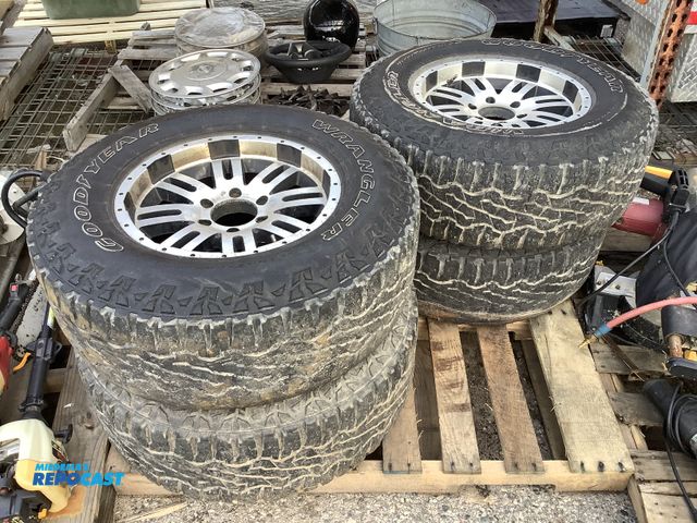 Lot 2-14751 - Lot of (4) wrangler Goodyear LT285/70R17 121/1180 vehicle tires with rims
