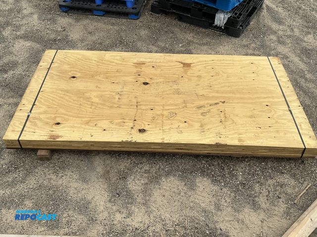 Lot 2-11580 - Stack of Treated Plywood - approx. 4’ x 95”