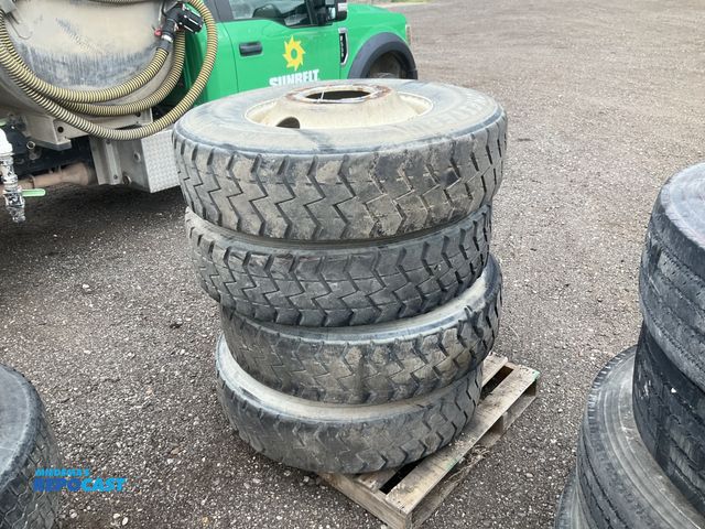 Lot 2-11828 - (4) recap 11R22.5 semi tires on steel wheels, used