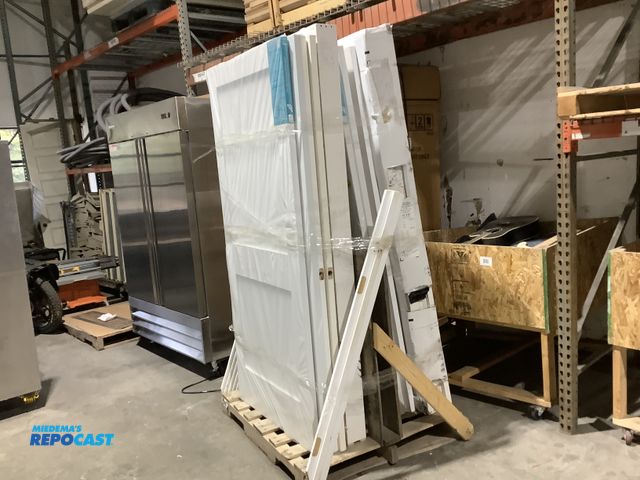 Lot 2-34938 - Skid lot of assorted white doors some with frames, windows, hinges, predrilled holes for handles…etc