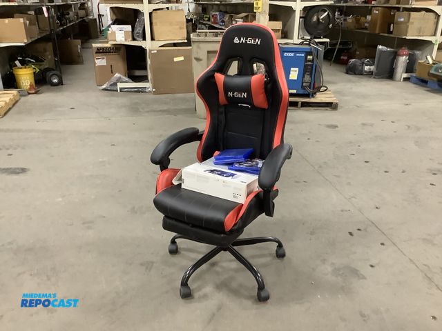 Lot 2-15580 - Gaming Lot including (2) Sony PlayStation portal remotest (4) dvd games, and red n-gen reclinable sp...