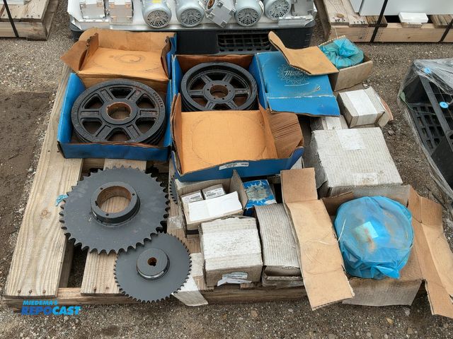 Lot 2-33817 - Skid of assorted sprockets, pulleys, &amp; power locks.