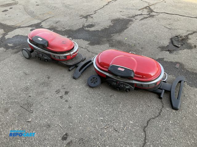 Lot 2-92503 - Lot of (2) Coleman 9949A 2 burner propane road trip outdoor grills with lockable lids. One has broke...