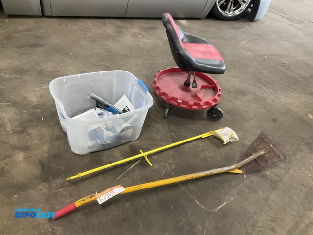 Lot 2-43439 - Shingle scraper, log roller, shop chair and a container with some flood light bulbs, vent covers and...
