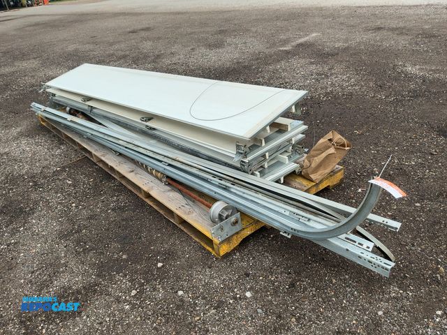 Lot 2-40629 - Used 12' Wide x 14' Tall Garage Door, panels are 12'x2', comes with tracks, springs, hinges, and rol...