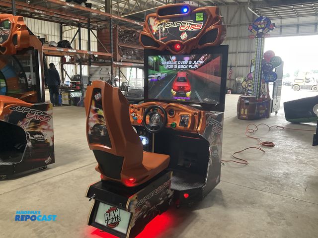 Lot 2-90905 - Raw Thrills Super Cars arcade driving game