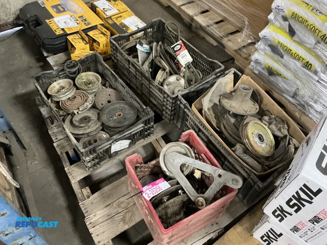 Lot 2-25256 - Large lot of plastic containers full of various Exmark zero turn and walk behind mower pulleys and b...