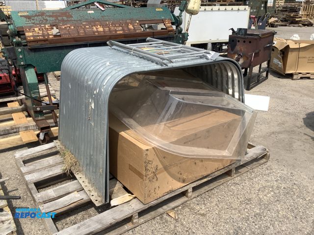 Lot 2-64461 - Skid lot of (2) metal ladders, (1) clear plastic well cover, (1) metal window well
