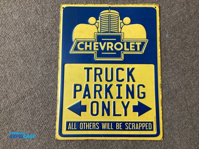 Lot 2-63206 - New Chevrolet metal sign by Open Road. Chevrolet truck parking only. All others will be scrapped . M...