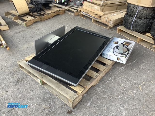 Lot 2-64457 - LG 4950K0176 TV Skid lot with LG TV remote and Simplicity SMF1-B1 medium full motion tv wall mount