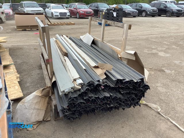 Lot 2-35258 - skid of large slide out rubber seals approx. 8 foot long