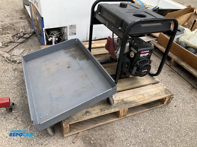 Lot 2-10379 - Gray rolling cart with a Coleman generator powermate 10HP model PM0525202, starts and runs
