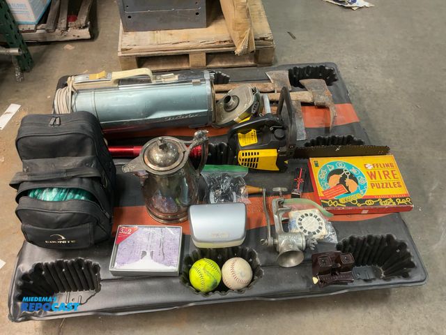 Lot 2-33596 - Lot of assorted household items. Includes axes, a chainsaw, a bowling ball, a pitcher, holiday cards...