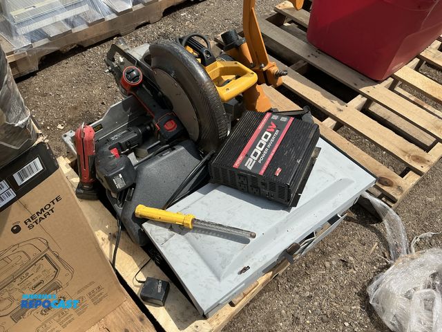 Lot 2-24635 - Skid lot of various saws dewalt compound miter saw model DW705 a drilling driver a power inverter et...