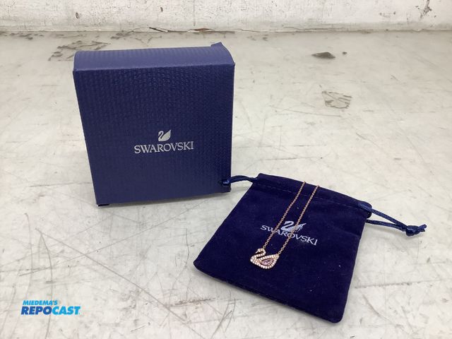 Lot 2-74025 - New Swarovski rose gold swan pendant/necklace