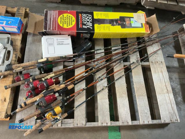 Lot 2-18991 - Skid lot of fishing items including standard marine radio HX230S VHF FM, fishin buddy lll, and vario...