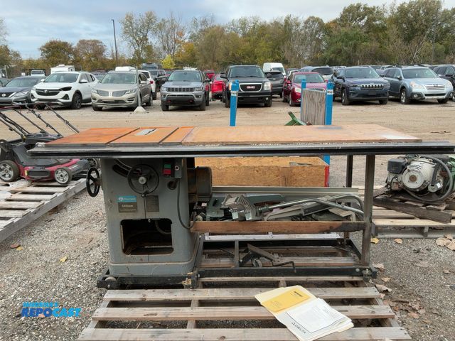 Lot 2-69425 - Rockwell delta unisaw table saw 24V