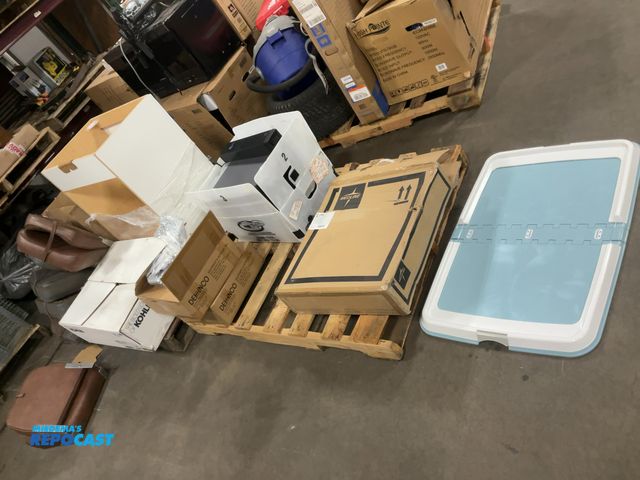 Lot 2-33616 - (2) skids of items including speakers radio a cover for a storage container a cabinet folding bathro...