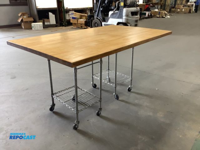 Lot 2-36797 - Table on (2) rolling carts measurements are approximately 38” x  78.5” x 45.5”