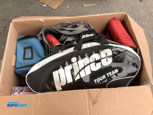 Lot 2-67630 - Box of assorted things Including: tennis racket and case, bean bag chair cover, flotation device, co...