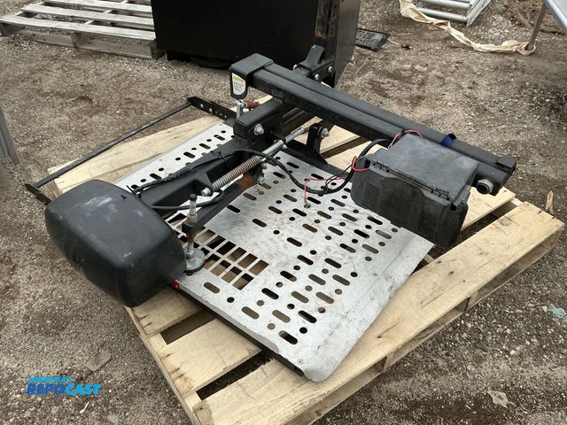 Lot 2-40540 - (1) black Harmar wheel chair lift with hitch to car battery powered
