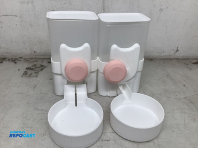 Lot 2-93507 - Lot of (2) clear and white mini food dispensers