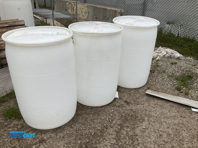 Lot 2-34914 - lot of 3 55 gallon white plastic barrels with 2 removable bungs, contained mineral oil