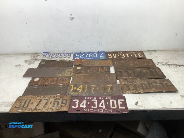 Lot 2-67171 - 16 Michigan license plates, 13.5”x6” and 12”x4.5”, most are rusted
