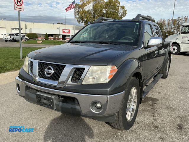 Lot 2-67259 - 2010 Nissan Frontier LE Double Cab Standard Box Pickup Truck 4x4