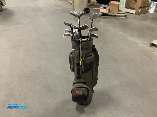 Lot 2-35124 - Lot of golf clubs and central Michigan bag, woods and driver are executive, and irons are acumark, p...