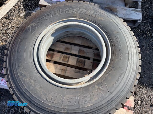 Lot 2-72676 - 1 Recapped Bridgestone 11 R 22.5 tire with rim.