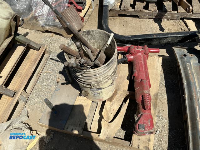 Lot 2-75316 - 90lb Pneumatic Jackhammer and a bucket of Concrete Core Drills other attachments