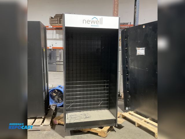 Lot 2-74411 - Newell Mini snack market storage unit with assorted hooks approx. 3.3’ x 2’x 6.6’ - has very slight ...