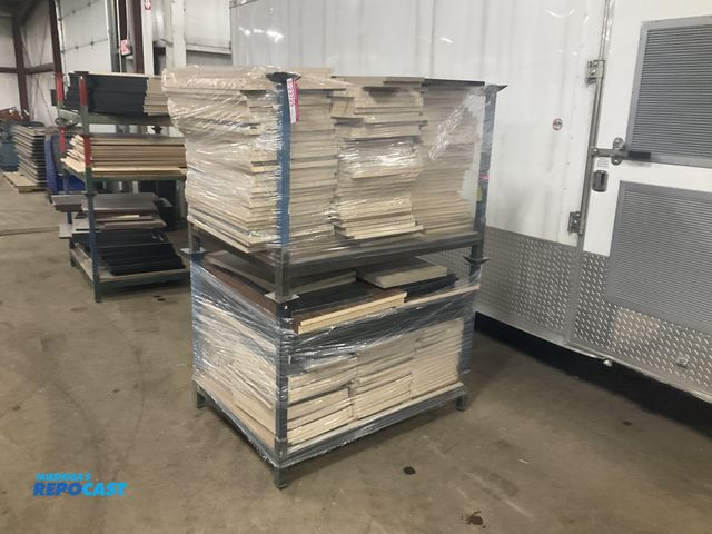 Lot 2-23729 - (2) stackable metal racks 35.5” x 48.5” full of misc wood cabinet panels/doors
