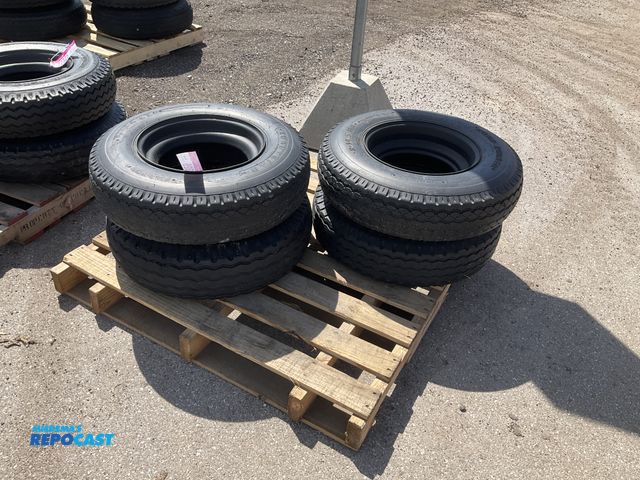 Lot 2-22326 - (4) 8-14.5 tires on steel mobile home style wheels, used