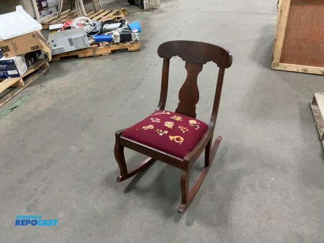 Lot 2-62703 - Cherry antique rocking chair. Hand embroidered upholstery.